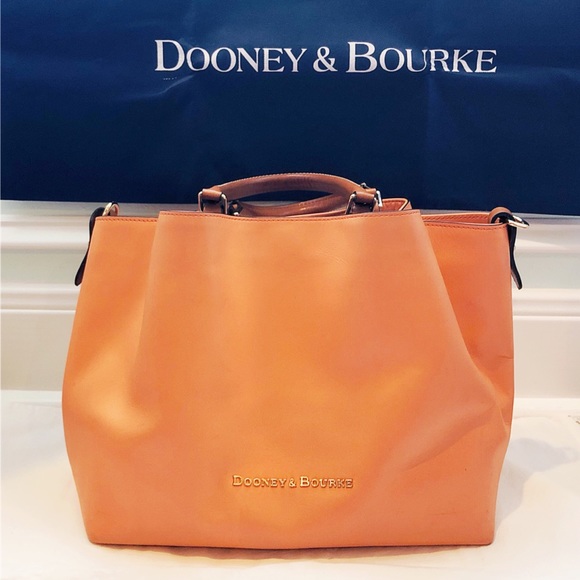 Dooney & Bourke Handbags - Dooney & Bourke, beautiful apricot leather purse.